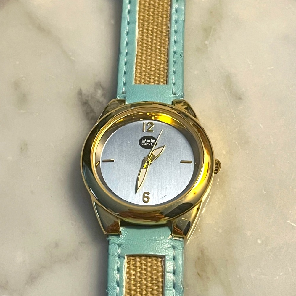 Yes or not blue, beige and gold watch stainless steel back